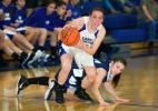 bob ford/times news Casey Rinfret of Palmerton heads to the basket after getting past Northern Lehigh's Tina Bastardi (on floor).