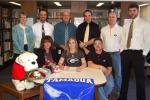 Tamaqua Area High School senior Allison Updike signs a letter of intent to continue her track and field career at the University of Georgia. Seated with Allison (front, center) are her parents, Jackie and Ralph Updike. In the back row are TAHS…