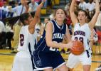 bob ford/times news Tamaqua's Amy Zehner prepares to go up with a shot as Nina Batts (left) and Chelsea Smelas of Jim Thorpe defend.