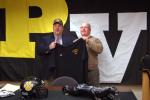 TJ ENGLE/TIMES NEWS Panther Valley's new head football coac Lon Hazlet is presented a PV footall coach shirt by principal Joe Gunnels.