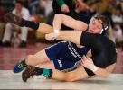 BOB FORD/TIMES NEWS Northern Lehigh's Zane Heller takes down Saucon Valley's Paul Sloand in the semi-finals. Heller won the bout 13-2.