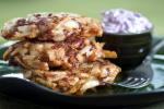 AP PHOTO Potato latkes, traditionally served at Hanukkah, are the inspiration for these corned beef and potato pancakes with pickled cabbage creme fraiche. The final product is new twist on the traditional Irish meal of corned beef and cabbage and…