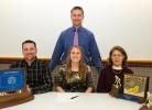 Bob Ford/times news Lehighton's Jordyn Homyak (front, center) signed a Letter of Intent to attend to the University at Albany on a field hockey scholarship. Taking part in the signing ceremony were her father Andy (seated, left), her mother Toni …
