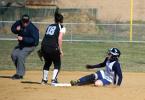 BOB FORD/TIMES NEWS Northern Lehigh's Erika Bowman slides safely into second base as East Stroudsburg North's Alexis Kutlu stands by the bag.