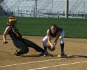 LINDA ROTHROCK/Special to THE TIMES NEWS Northwestern Lehigh's Nicole Metzger slides back in to first as Catasauqua's Amanda Strohl misses the throw.