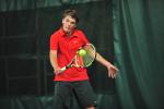 Northwestern's Henry Paiste backhands a return during the finals of the District 11 Class AA Tennis Tournament on Monday. Paiste defeated Andrew Ma of Moravian Academy in three sets to capture the championship.