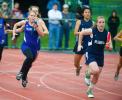 bob ford/times news Tamaqua's Maria Streisel (right) runs the anchor leg of the 400 meter relay after taking the baton from teammate Caitlin Trainer (behind her). At left is Palmerton's Sarah Andrews. Tamaqua finished first in the event and…