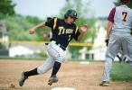 bob ford/times news Northwestern's Andrew Rivera rounds third base and heads home as Lehighton third baseman Alex Storm (right) waits for his teammates to get the ball back to the infield.
