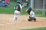 RON GOWER/TIMES NEWS Franklin Township's Zach Knox runs home as the throw to the plate drops in front of Towamensing catcher Mike Sander during Senior Babe Ruth league game in Forest Inn, Sunday.