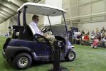 AP PHOTO Penn State head coach Joe Paterno holds a press conference from his golf cart at the school's indoor football training facility during NCAA media day on Tuesday.