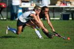 bob ford/times News Northern Lehigh's Lauren Zellner (front) and Northwestern's Lauren Horner reach for control of the ball during Wednesday's Colonial league field hockey game.