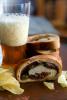 This Jan. 4, 2012 photo shows Super Bowl stromboli in Concord, N.H. To serve, stromboli are simply sliced like a loaf of bread, creating a spiral baked sandwich that is perfect for large parties. (AP Photo/Matthew Mead)