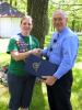 STACEY SOLT/SPECIAL TO THE TIMES NEWS Carbon County Commissioner Wayne Nothstein, right, presents Girl Scout leader Larissa Kimmel with a proclamation marking the group's celebration. He noted that Girl Scouts now claims 3.8 million members…