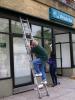 SPECIAL TO THE TIMES NEWS Roy Christman, Towamensing Township, and Amresse Farrow, Lehighton, put the finishing touches on the front windows of the new Carbon County Democratic Headquarters for their Grand Opening Ceremony Wednesday, May 23, 5-7 p.m…