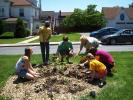 JASON SANDER/SPECIAL TO THE TIMES NEWS Planting flowers in downtown Lehighton to commemorate 100 years of 4-H in Pennsylvania is, from left, Eliza Asmann, Brandon Ruch, Brandon Everett, group organizer Kay Gilbert, Brianna Keiser and Erin McGinley.