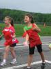 STACEY SOLT/SPECIAL TO THE TIMES NEWS ABOVE LEFT: Georgianna Messinger, Olympic Day organizer and Mahoning Elementary physical education teacher, far right, addresses students during their Olympic Day closing program. Behind her are the flags…