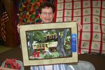 Diane Minor took a first place prize at the West End Fair with a quilted wall hanging of a cottage at Honeoye Lake in New York. She said it has 450 pieces. Minor planned the design from a photograph. She exhibited it at the quilt show sponsored by…
