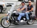 ANDREW LEIBENGUTH/TIMES NEWS Joe and Wendy Seigenfuss, of Tamaqua, ride their 2005 Suzuki Boulevard during the Santa convoy.