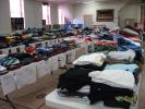 STACEY SOLT/SPECIAL TO THE TIMES NEWS Hundreds of clothing items, sorted by gender and size, await "shoppers" during the annual clothing giveaway at St. John's Lutheran Church in the Heights, Jim Thorpe. The giveaway begins Thursday.