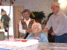 STACEY SOLT/SPECIAL TO THE TIMES NEWS Elisa DelGreco, center, blows out the candles on her 103rd birthday cake. Standing are her daughter Maria Leickel, left, and son-in-law William Leickel, both of Slatington. DelGreco currently lives in the Summit…