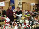 STACEY SOLT/SPECIAL TO THE TIMES NEWS Amanda Tertel, left, and Sarah Dalton, volunteers at the Trinity Thrift Store in Lehighton, help to set up the "snowman" display at the annual Christmas sale. The Trinity Thrift Store's Christmas sale will…