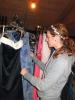 STACEY SOLT/SPECIAL TO THE TIMES NEWS @$:Jade Farquhar, a sophomore at Palmerton Area High School, looks through racks of prom dresses at the annual Prom and Wedding Dress Sale at Penn's Peak. The sale benefited Dream Come True.