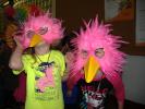 STACEY SOLT/TIMES NEWS Olivia Claypoole, 5, left, and Hailey Barachie, 5, wear masks during a circus parade at Pathstone Head Start's annual "Circus Day."
