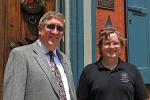 VICTOR IZZO/SPECIAL TO THE TIMES NEWS Bob Stevenson, left, a board member of St. Luke's Miners Memorial Hospital, and Taylor Handwerk, right, an organizer for the St. Luke's Black Diamond Garden Party, meet on the steps of the historic home, which…