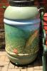 LINDA KOEHLER/TIMES NEWS This rainbarrel, "About to Rise" was painted by Don Baylor and is located at Dunkleberger's on Main St., Stroudsburg.