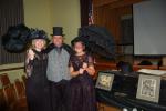 LINDA KOEHLER/TIMES NEWS Concourse Club of Palmerton members, left, Christine Campbell and Barbara Hafer-Prout, right, came dressed for a Victorian funeral at the October meeting. "Undertaker" Dale Freudenberger, president of the Tamaqua Historical…