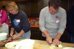 Gail Maholick/times news Marla Haydt and her son, Rusty Haydt, prepare "The Works Pizza" during the first "Share Our Strength's Cooking Matters for Adults," program held at Zion United Church of Christ, sponsored by Second Harvest Food Bank.