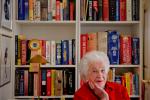 Longtime crossword constructor Bernice Gordon born on Jan. 11, 1914, poses for a portrait with her dictionaries at her home, Tuesday, Dec. 31, 2013, in Philadelphia. The New York Times is scheduled publish one of her puzzles, making her the first…