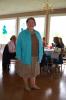Gail Maholick/TIMES NEWS Diana Ahner wears a turquoise shirt over a tan and brown skirt.