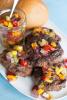 AP Photo/Matthew Mead Grilled tomatillo and mango salsa over blue cheese meatloaf  burgers. This summer grilling recipe combines meat, vegetables and fruit.