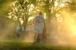 FILE - In a Monday, April 5, 2010, file photo, Shane Nantz kicks up a cloud of pollen as he mows the front yard of his west Charlotte, N.C., home. Seasonal allergy sufferers can try newly FDA-approved types of immnotherapy, once-a-day tablets…