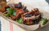 This May 5, 2014 photo shows Memphis-style baby back ribs in Concord, N.H. Back ribs usually are sold in either full slabs (13 ribs) or half slabs (7 ribs), and are the most expensive cut of rib. When they come from a pig that was less than a year…