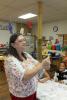 ABOVE: Martha Cox, a second grade teacher at Franklin Elementary School, shows  students how to create a drinking straw  rocket during a summer learning session. RIGHT: Sophia Coleman, left, and Ariana DiBuo prepare to launch their rockets. In the…