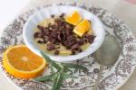 This Sept. 29, 2014 photo shows orange zest pudding with dark chocolate shavings in Concord, N.H. Orange zest, the thin outer skin of an orange, has fragrant and flavorful oils that can add sweetness to dishes. (AP Photo/MatthewMead)