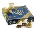 This undated image provided by Harbor Sweets shows the company-s Â¨Chanukah BoxÃ of chocolates decorated with a menorah. Harbor Sweets, a small New England handcrafted chocolate company, created the box in response to demand among customers who…