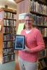 Stacey Solt/Special to the Times News Diane Danielson, the librarian at Palmerton Area Public Library, with an electronic copy of "Shakespeare Saved My Life." The book is being offered as part of a worldwide electronic book club, which is open to…