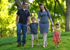 In this photo taken on Thursday, June 4, 2015, from left, the Chudoba family, Chad Chudoba, Isaac Chudoba, Rachel Chudoba and Alexandra Chudoba, spend family time together as they walk through Myriad Gardens in Oklahoma City. Rachel and Chad are…