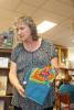 Stacey Solt/Special to the Times News Kathy Long, a professional storyteller and employee at Lehighton Area Memorial Library, tells the folktale "The Magic Pomegranate" to children and adults during the library's Thursday evening story time. Here…
