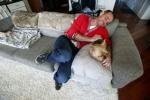 In this photo taken last month, Dr. Rob Garofalo pets his dog, Fred, at their home in Chicago. Garofalo, who is head of the adolescent medicine division at Lurie Children's Hospital of Chicago, tested positive for the AIDS virus in 2010. He fell…