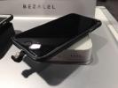 ABOVE: A charging case for an iPhone 6 sits on a wireless charger, both made by Bezalel, at the Sands Expo during the CES International gadget show in Las Vegas Thursday. The product uses the Qi wireless charging technology. AP PHOTO/RYAN NAKASHIMA…