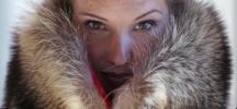 Pam Paquin poses with an "accidental fur" raccoon neck muff. Paquin's company, Petite Mort, uses roadkill fur harvested from animal carcasses culled with the help of highway departments and animal control officers. AP PHOTO