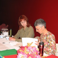 Coleen and Denise signing in people