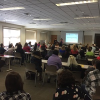 Crowded room ready to hear Jean Chung, MSN, CRNP present on ECMO