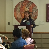 Jean Little, BSN, RN, PCCN-CMC, the Program Chair addressing the crowd. 