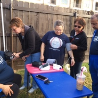Checking patient's blood pressure prior to walk start