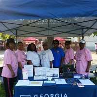 L-R:   Theresa, Niya, Tracey, Beulah, Wendy, Janis, and Eunice taking opportunity to recruit new members at Sista Strut